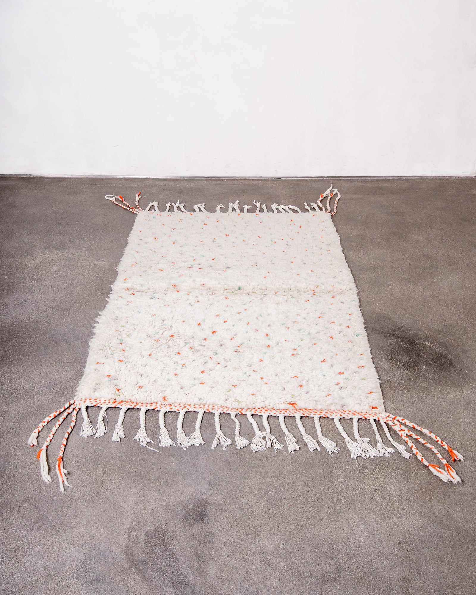 Modern, designer, handcrafted Berber rug from Morocco. Beniourain carpet with beautiful colours and patterns and fluffy wool texture.
